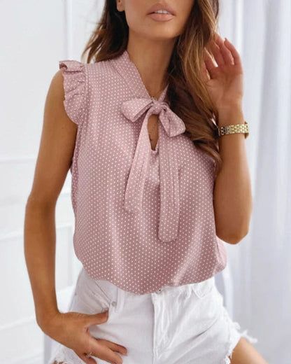 Elegante ärmellose Bluse mit Rüschen und Schleifendetail