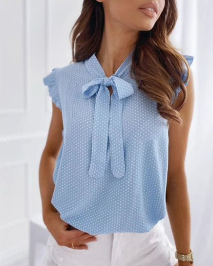 Elegante ärmellose Bluse mit Rüschen und Schleifendetail