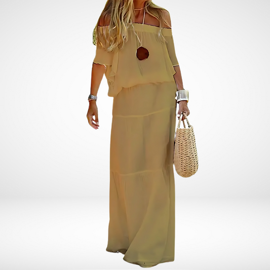 Elegantes weißes schulterfreies Maxi-Strandkleid