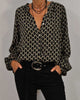 Damenbluse mit V-Ausschnitt und geometrischem Muster