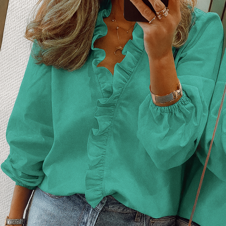 Blaugrüne Bluse mit Rüschenbesatz und Puffärmeln