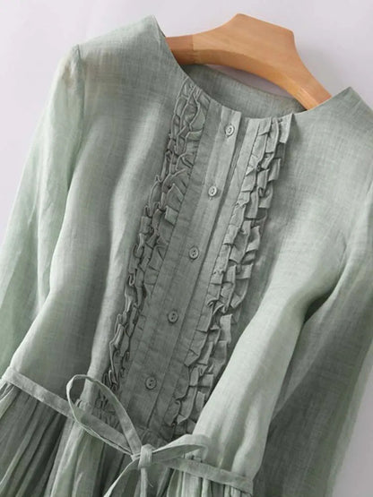 Stilvolles Leinenkleid mit Knopfleiste und V-Ausschnitt