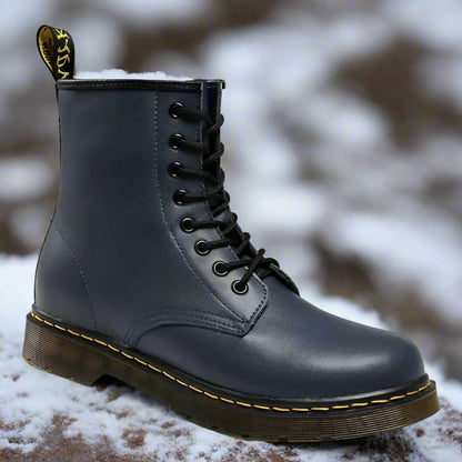 Elegant women's lace-up boots with durable leather, sleek design, and versatile style for comfort and sophistication.