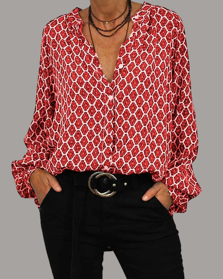 Damenbluse mit V-Ausschnitt und geometrischem Muster